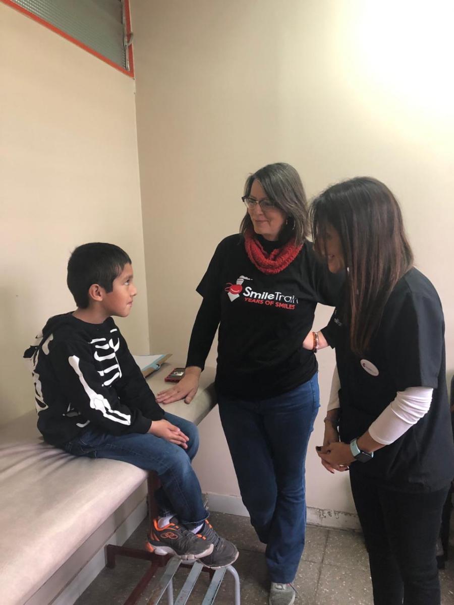 Silvia with a patient in a doctors' office