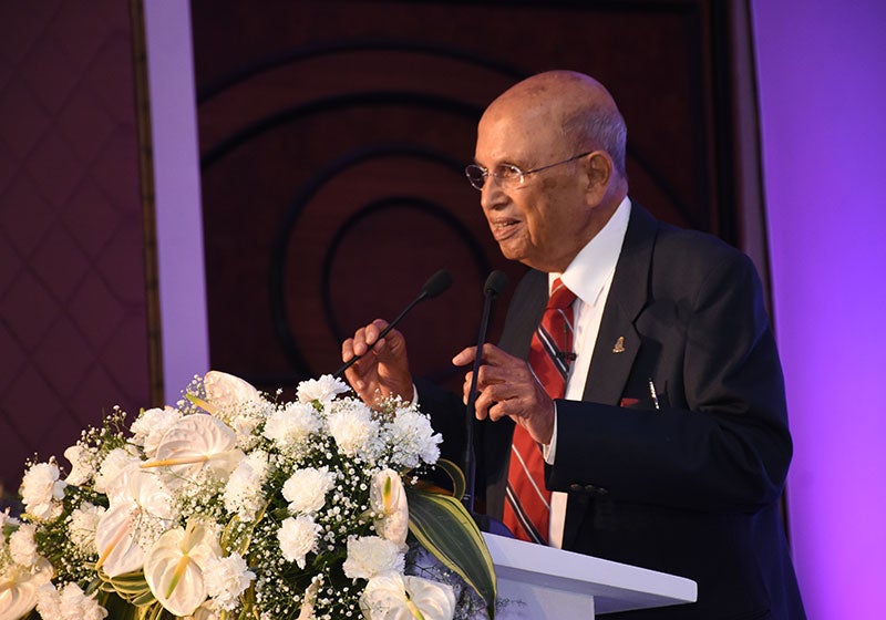 Dr. Adenwalla speaking at a conference