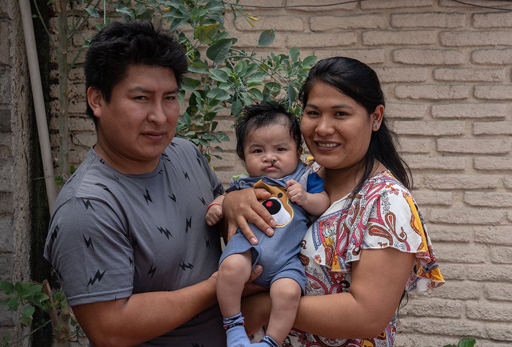 Miguel with his parents, Jose and Zulema