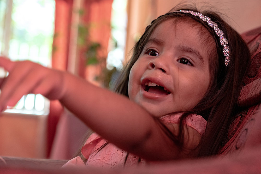 Isabella smiling after cleft surgery