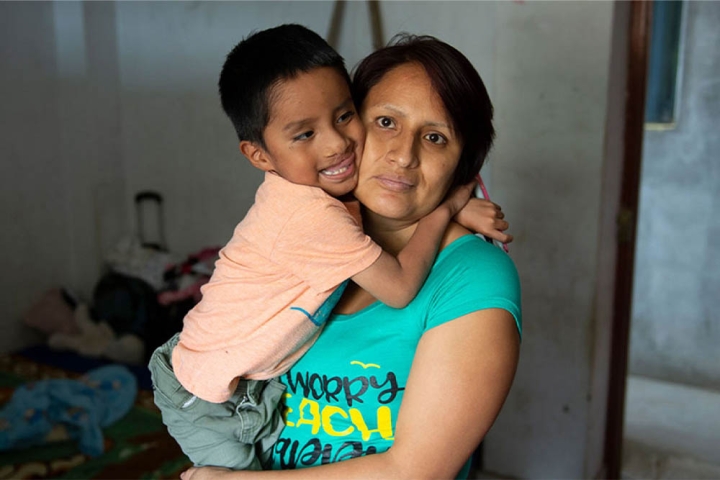 Anghelo hugging his mother after cleft surgery